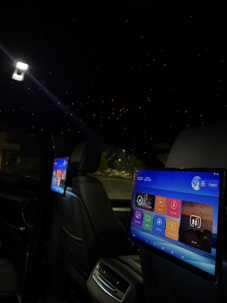 Pearson Limo Toronto black truck cabin with dual entertainment screens